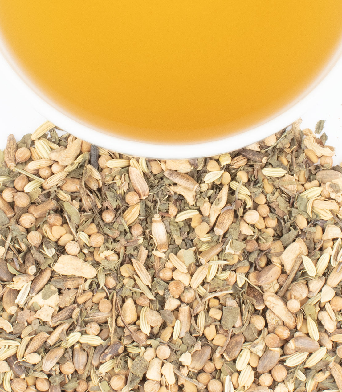 Organic Milk Thistle Mint tea sachets, with a blend of herbs and spices, displayed alongside a cup of brewed tea.
